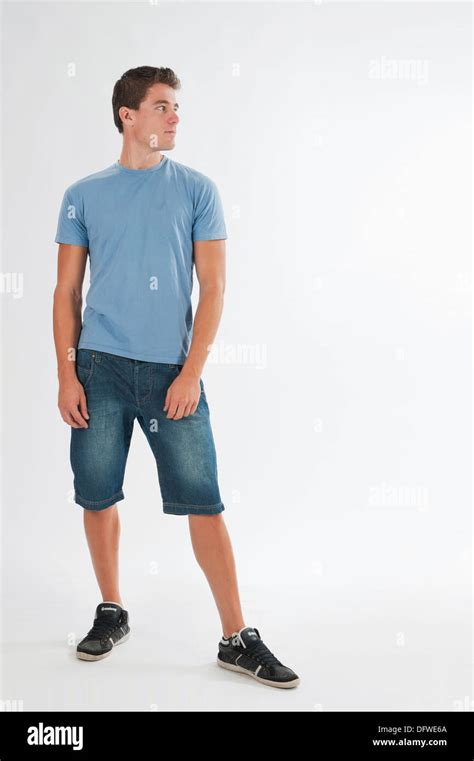 Full Body Photograph Of A Teenage Boy Standing Stock Photo Alamy