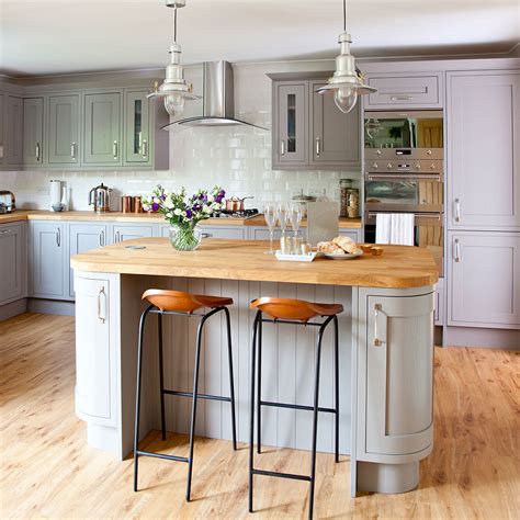 Metal pulls on the cabinets and drawers add shine to the room. Grey kitchen ideas that are sophisticated and stylish ...