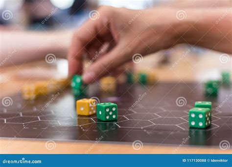 People Play A Board Game With Dice Stock Photo Image Of Strategy