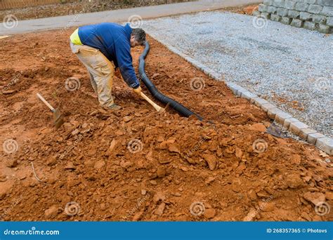When Heavy Rains Are Predicted The Worker Digs A Trench So The