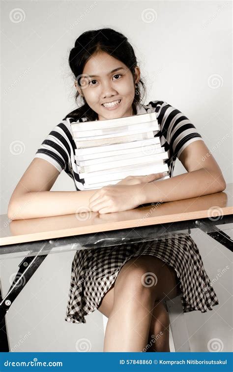 Smiling Student At Desk Stock Photo Image Of Aged Stack 57848860