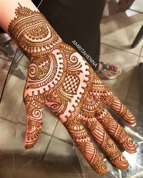 The Henna Is On Someone S Hand