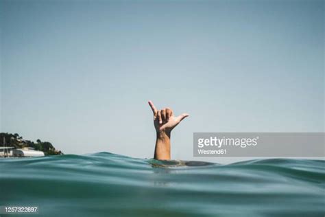 Hang Loose Sign Photos And Premium High Res Pictures Getty Images