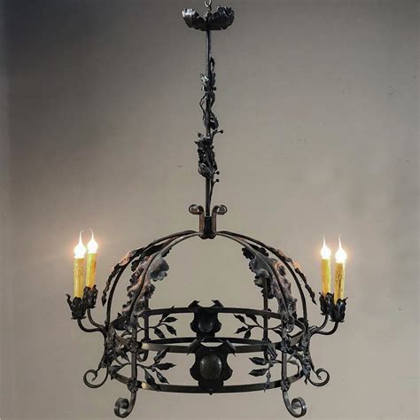 Just scroll down and your eyes will. Antique Italian Wrought Iron Chandelier - Inessa Stewart's ...