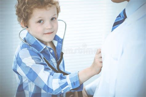 Doctor And Patient Child Physician Examining Little Boy Regular
