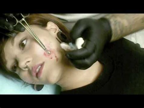United states / michigan / muskegon / the third dimension custom tattooing. Cheek Dermal Anchors - YouTube