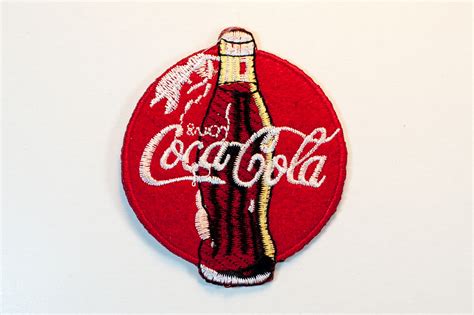 They feel certain of their logo so they can make it disappear! Coca-Cola Logo | Getting Stitched