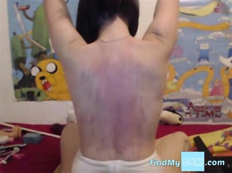 Caning Her Back Spanking Tits