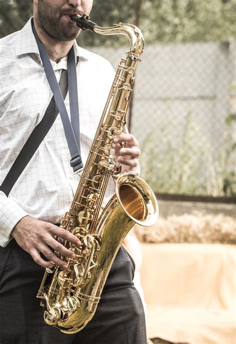 A Man Plays The Saxophone Stock Photo Image Of Musician 99612664
