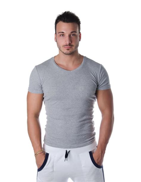 Handsome Friendly Young Man Standing In T Shirt And Jeans Stock Photo