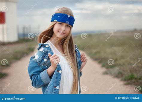 Girl Posing Against The Cloudy Sky And Coastline Stock Image Image Of Blond Coastline 149862697