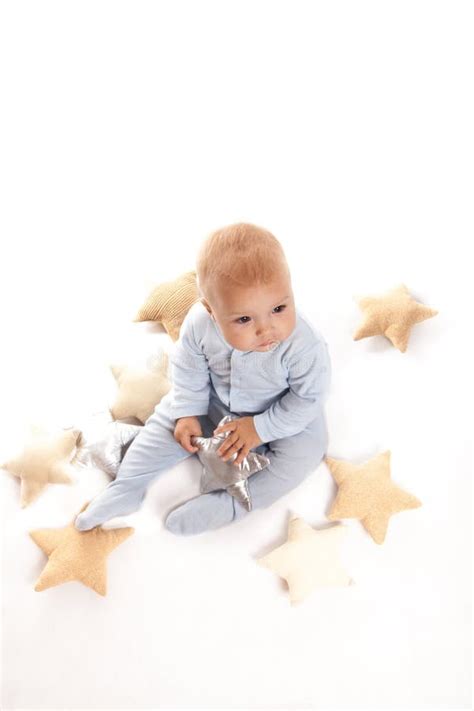Baby Boy With Stars The Little Prince On A White Background Stock