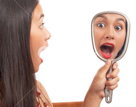 Girl Surprised At Looking In The Mirror Royalty Free Stock Image
