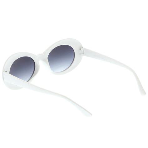 retro white oval sunglasses with tapered arms neutral colored gradient sunglass la