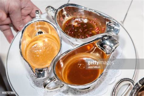 Hand Holding Gravy Boat Photos And Premium High Res Pictures Getty Images