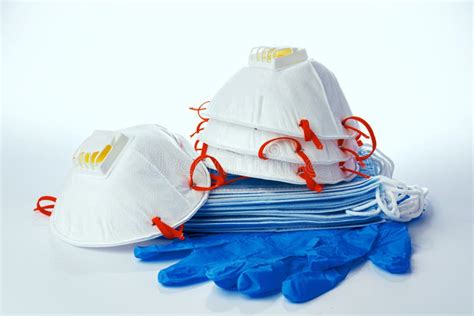 Medical Masks With Sterile Latex Gloves On White Background Stock Photo