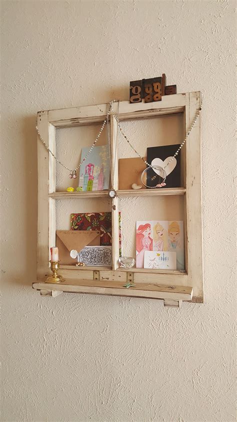 Hey guys, is it easy to decorate a room on a budget? Antique window made into a shelf for oddities. By Rhye ...