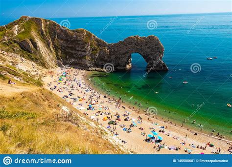 Tourists Relaxing On Durdle Door Beach Dorset Editorial Photo Image