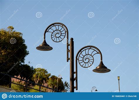 Lyme Regis Lampost In The Shape Of An Ammonite Fossil Stock Image