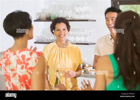 Friends Talking At Party Stock Photo Alamy
