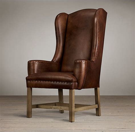 Even more casual with the slipcover which would be easy to duplicate in other colors with inexpensive fabric. Belfort Wingback Leather Armchair | Leather dining chairs ...