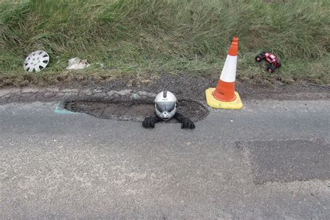 Man Stages Hilarious Pictures To Highlight Pothole Cornwall Live