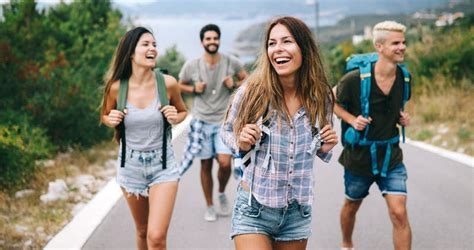 Group Of Happy Friend Traveler Walking And Having Fun Travel Lifestyle