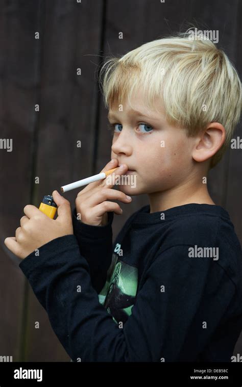 Child Blond Boy Smoking Cigarette Stock Photo Alamy