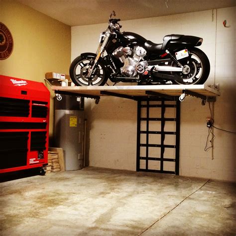 Its Like A Piece Of Art Dreamgarage Garage Garagestorage Motorcyclestorage Motorcyclelift