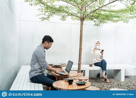 Freelancer Work Using Laptop In Cafe Stock Photo Image