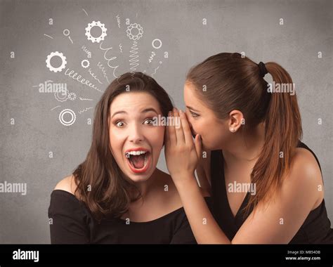 Two Girlfriends In Elegant Black Dress Sharing Secrets With Each Other