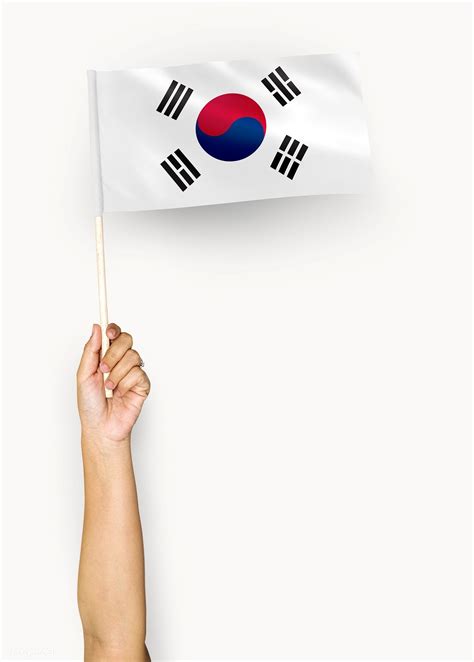 Person Waving The Flag Of South Korea Free Image By
