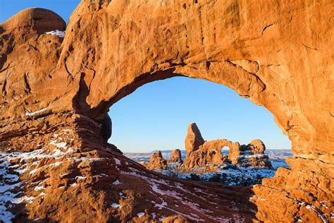 Turret Arch Through The North Window At Sunrise Photograph By John