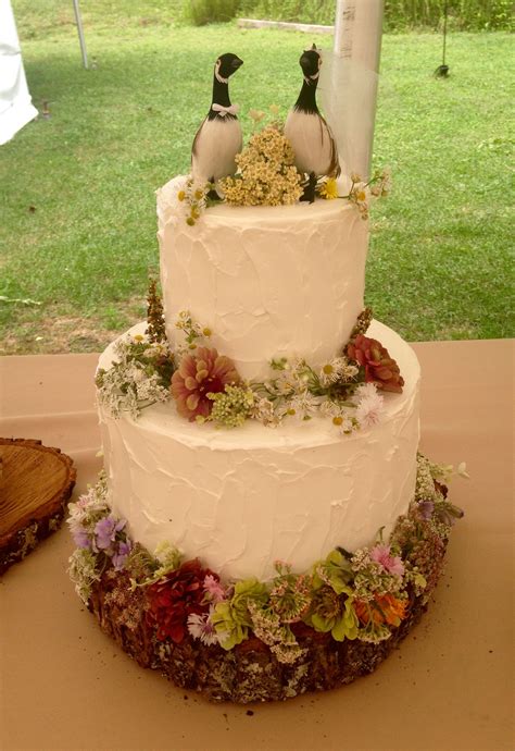 Rustic Buttercream Wedding Cake With Fresh Wild Flowers And Geese Cake