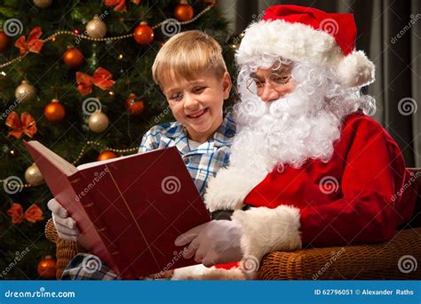 Santa Claus And A Little Boy Stock Image Image Of List Embrace 62796051