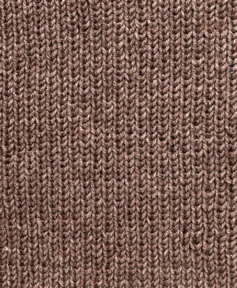Premium Photo Knit Pattern Close Up Of Knitted Wool Texture Brown