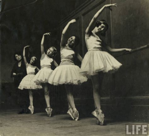 An Old Black And White Photo Of Four Ballerinas