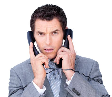 Busy Businessman Using Two Telephones Stock Image Image Of