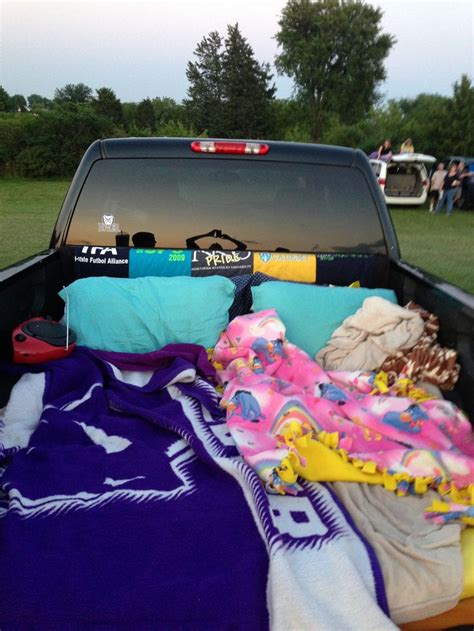 Truck full of blankets and pillows for the drive in movie | DIY
