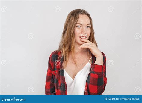 Freestyle Young Woman With Freckles Standing Isolated On Grey Looking