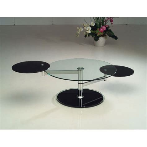 A coffee table is the focus of any living room furniture layout and creates the perfect spot for entertaining. Modern swivel glass top coffee table Grosseto