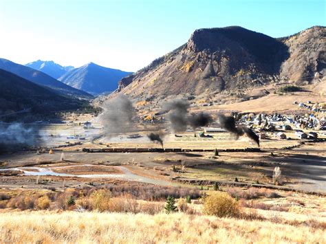 473 with 476 as midtrain helper pulling into Silverton - 10-16-2023