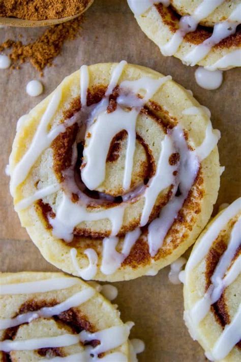 Starting at the long end, roll up the sugar cookie dough carefully jelly roll style. Cinnamon Roll Sugar Cookies - The Food Charlatan