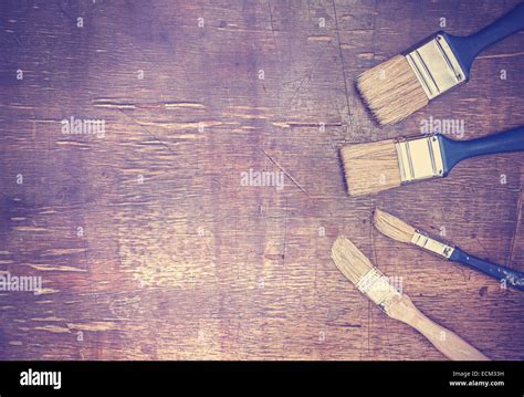 Paintbrushes On An Old Wooden Table Space For Text Stock Photo Alamy