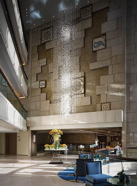 A Nearly 33 Foot Shimmering Water Wall In The Lobby Of The