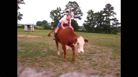 Girl Rides Bucking Cow Part 2 Youtube