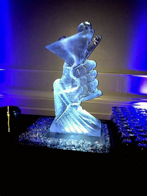 Ice Luge Of A Hand Holding A Martini Glass Iceluges