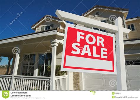 Sold Home For Sale Sign And New House Royalty Free Stock Photography