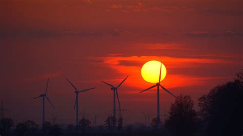 2048x1152 Wind Turbines Evening Sunlight Energy Sunset 2048x1152