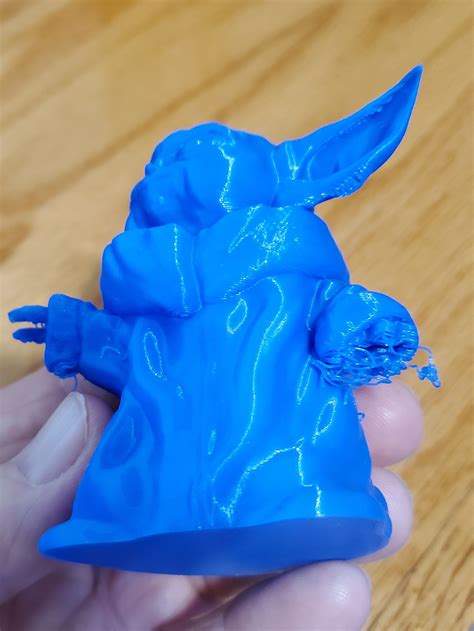 3d Printable Baby Yoda Smiling By David Magginnis